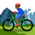 🚵🏾 person mountain biking: medium-dark skin tone display on Samsung